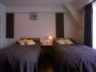 Tabiyu Abrigo Aparthotel Kobe Kamer foto